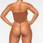 SKIMS STRAPLESS Thong Bodysuit Sculpt Sculpt من Skims Kim Kardashian 